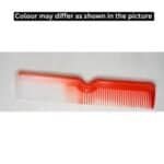red plastic hair comb